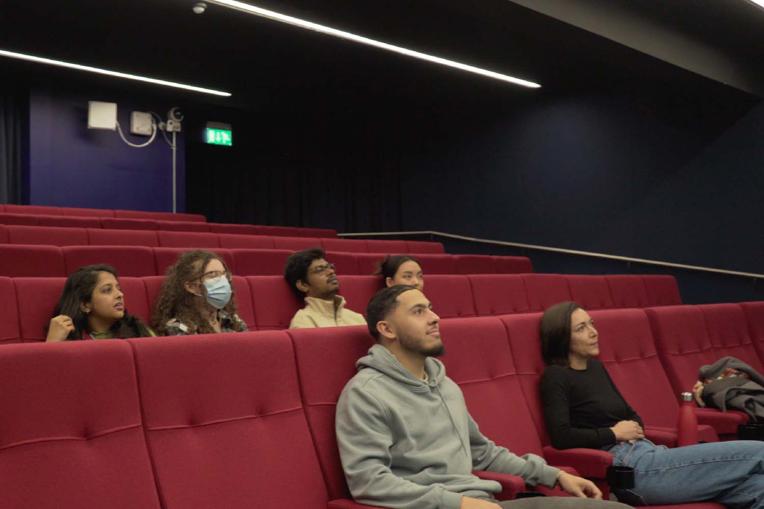 students watching in the cinema room